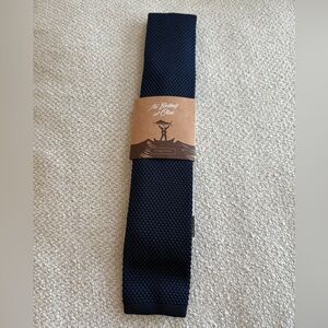 The brothers at Otaa Navy knit tie